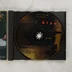 Nyitott CD-tok az arany színű lemezzel