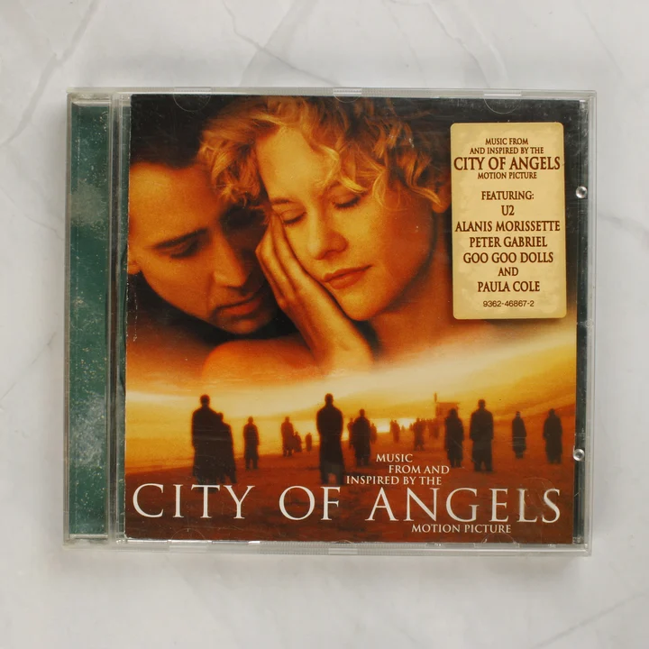 City of Angels filmzene CD elülső borítója Nicolas Cage és Meg Ryan fotójával
