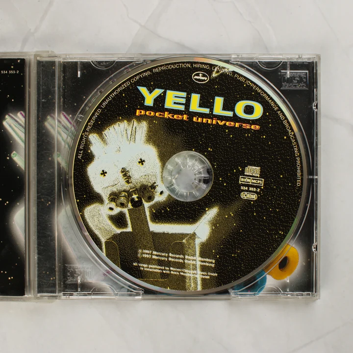 Yello Pocket Universe CD lemez a nyitott tokban