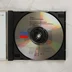 A nyitott CD-tok a lemezzel