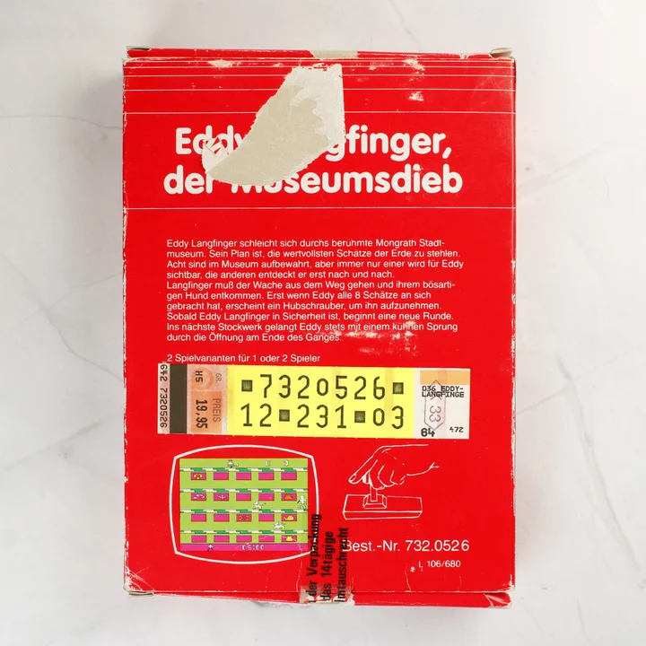Eddy Langfinger, der Museumsdieb Atari 2600 játék dobozának hátoldala sérüléssel