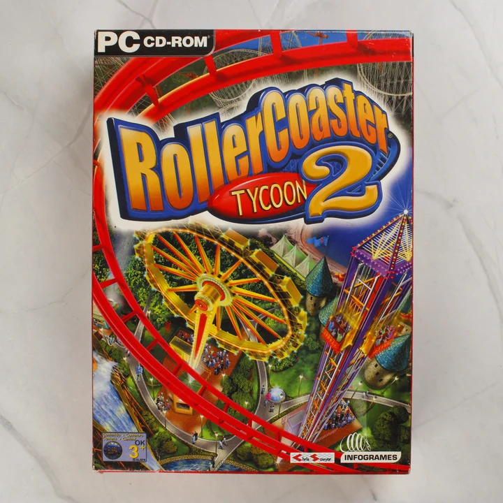 RollerCoaster Tycoon 2 PC játék dobozának előlapja