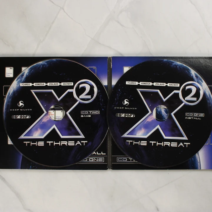 X2: The Threat két darab CD-ROM lemeze