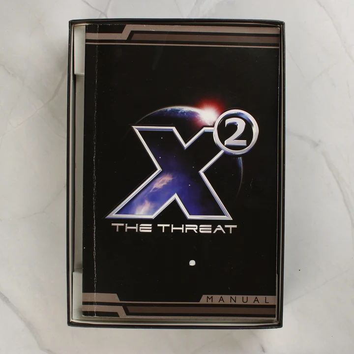 X2: The Threat felhasználói kézikönyv a dobozban