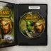 A World of Warcraft: The Burning Crusade nyitott tokja a lemezzel és a kézikönyvvel