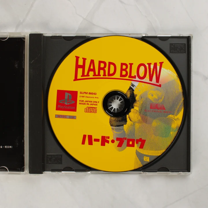 Hard Blow PlayStation sárga színű játéklemez a nyitott tokban