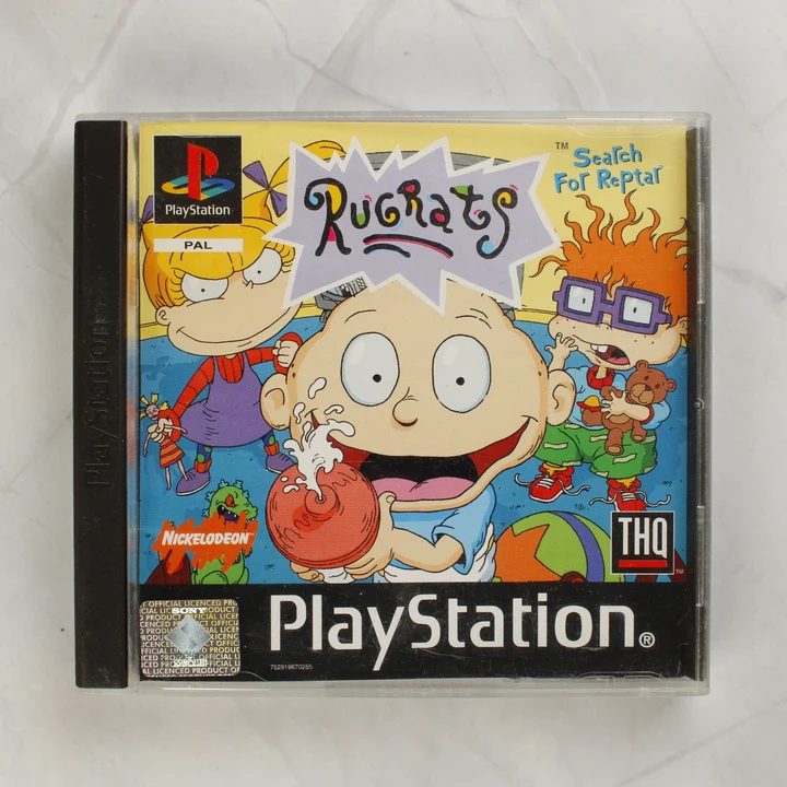Rugrats Search for Reptar PS1 borító Rugrats: Search for Reptar PlayStation játék elülső borítója