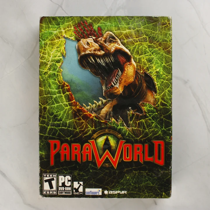 ParaWorld PC játék dobozának előlapja dinoszauruszos grafikával