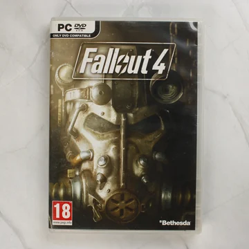 Fallout 4 PC játék borítója Power Armor sisakkal