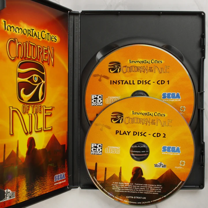 Nyitott tok az Immortal Cities: Children of the Nile két CD lemezével