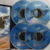 Négy darab kék CD lemez a Microsoft Flight Simulator 2004 játékhoz