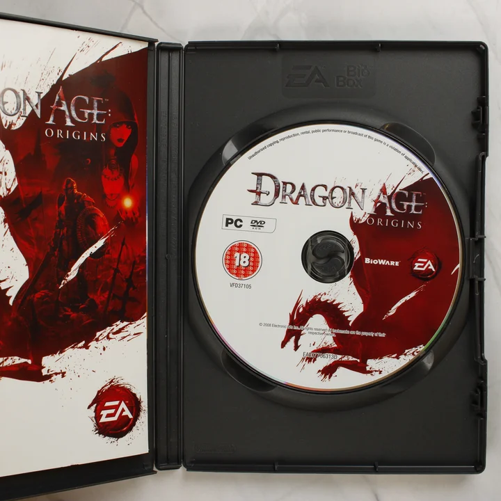 Dragon Age: Origins nyitott tok és lemez