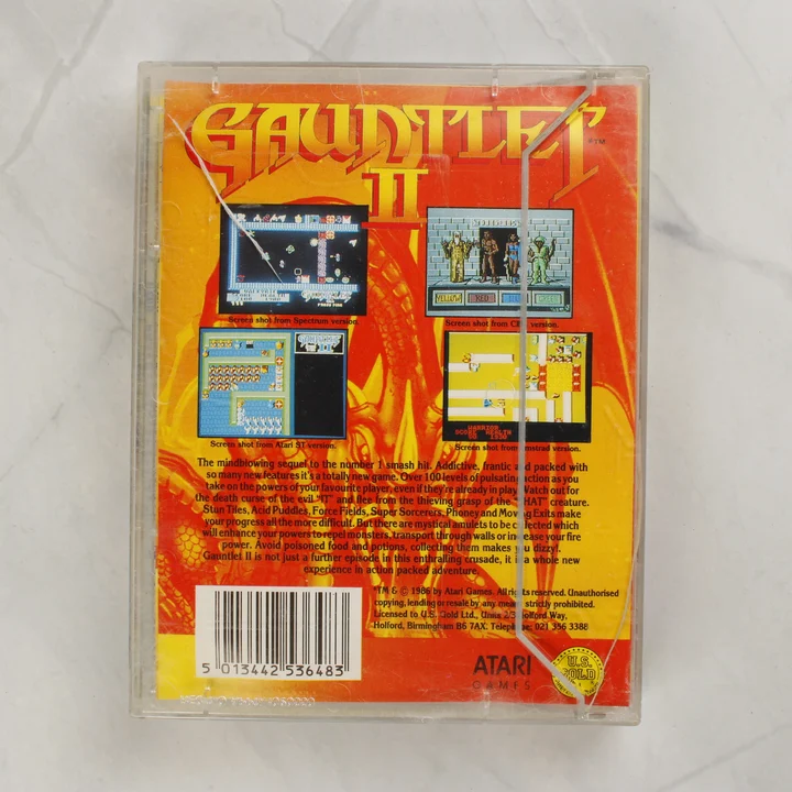 Gauntlet II videójáték hátoldali borítója képernyőképekkel