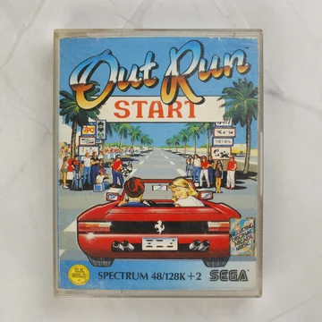 Az Out Run videójáték elülső borítója a műanyag tokban.