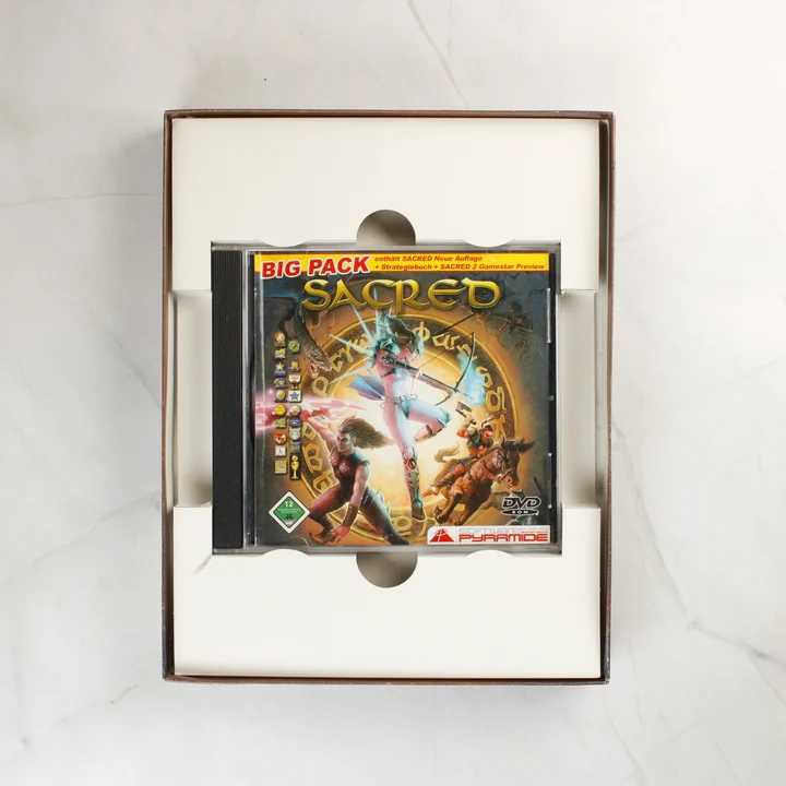 Sacred Big Pack belső nézet Sacred Big Pack nyitott doboza a belső tokkal