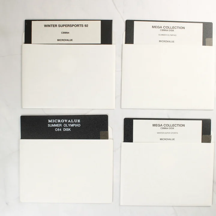 Mega Collection C64 floppy lemezek Négy darab 5,25 colos floppy lemez papírtokban