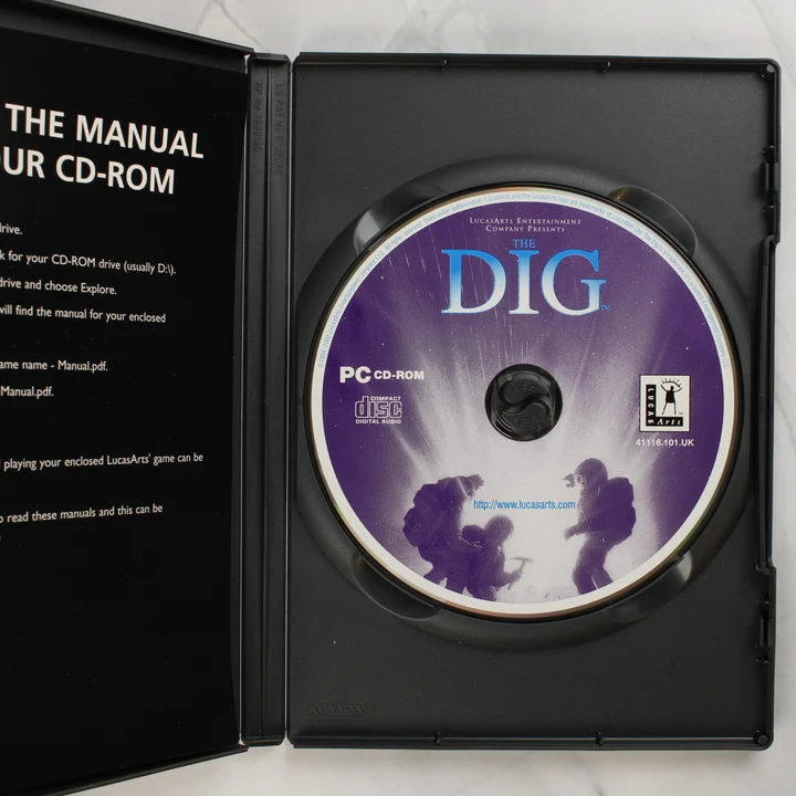 The Dig PC CD-ROM lemez a nyitott tokban