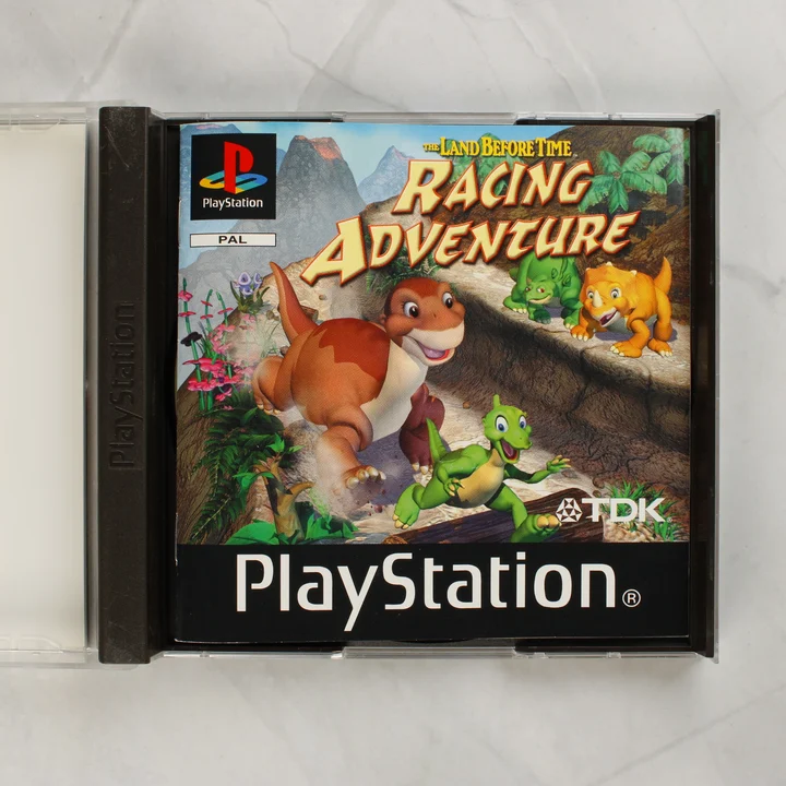 The Land Before Time Racing Adventure kézikönyv The Land Before Time: Racing Adventure kézikönyv és nyitott tok