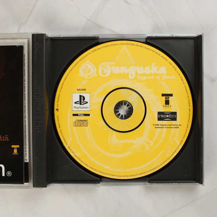 Tunguska: Legend of Faith sárga PlayStation lemez a tokban
