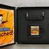 Nyitott Nintendo DS tok a WarioWare Touched! cartridge-dzsel