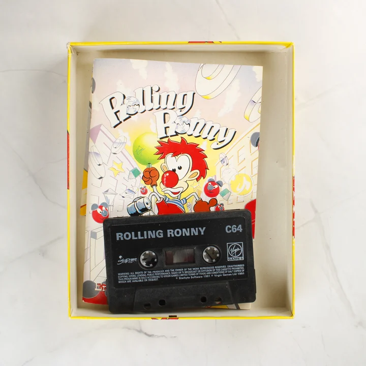 Rolling Ronny kazetta és útmutató a dobozban