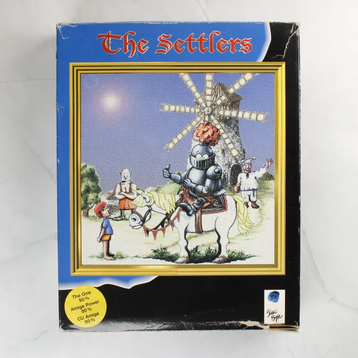 The Settlers Amiga doboz elölnézet The Settlers Amiga játék dobozának előlapja lovaggal és szélmalommal