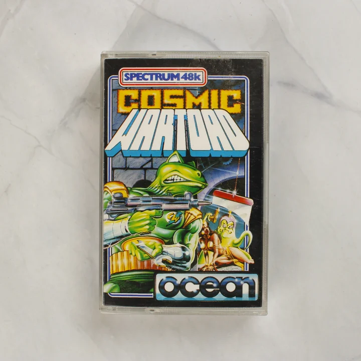 A Cosmic Wartoad videójáték elülső borítója műanyag tokban.