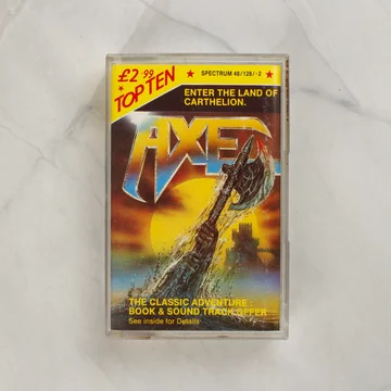 Az Axe videójáték elülső borítója műanyag tokban.