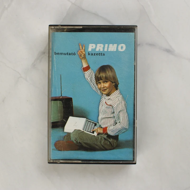 Primo bemutató kazetta tokban, színes borítóval