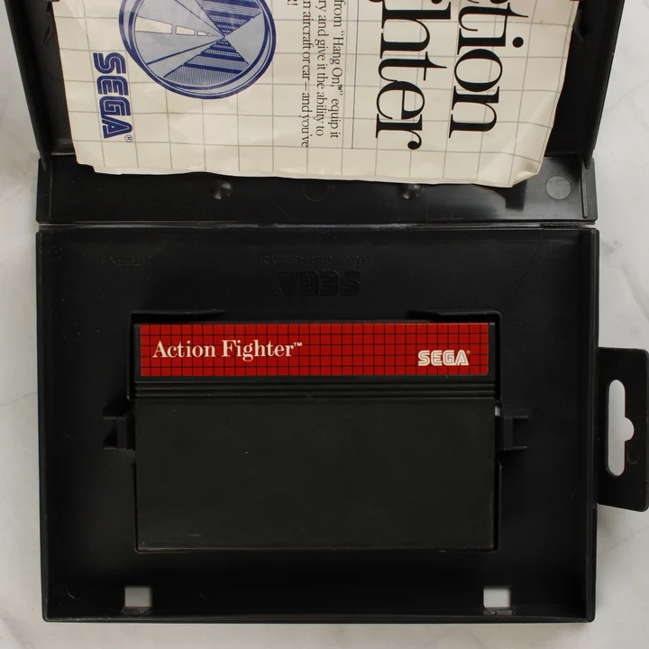 Action Fighter cartridge és útmutató a nyitott tokban