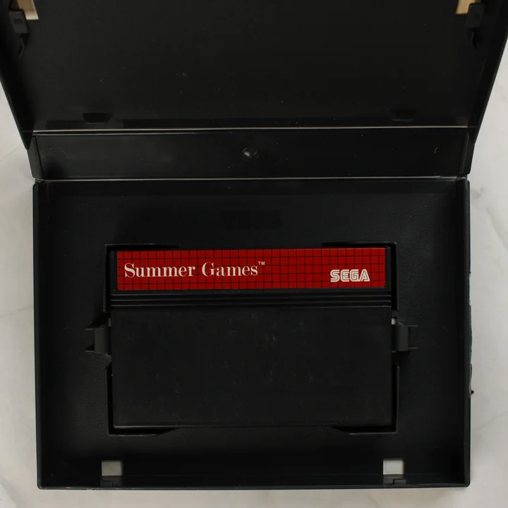 Sega Summer Games nyitott tok a cartridge-dzsel