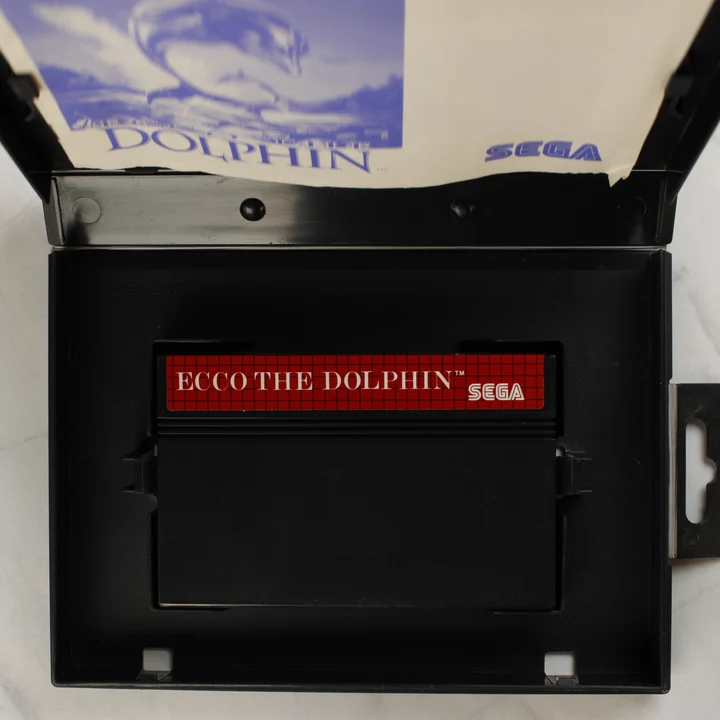 Ecco the Dolphin nyitott tok cartridge-dzsal és útmutatóval