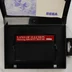 Nyitott Sega Master System tok a Land of Illusion cartridge-dzsel és útmutatóval