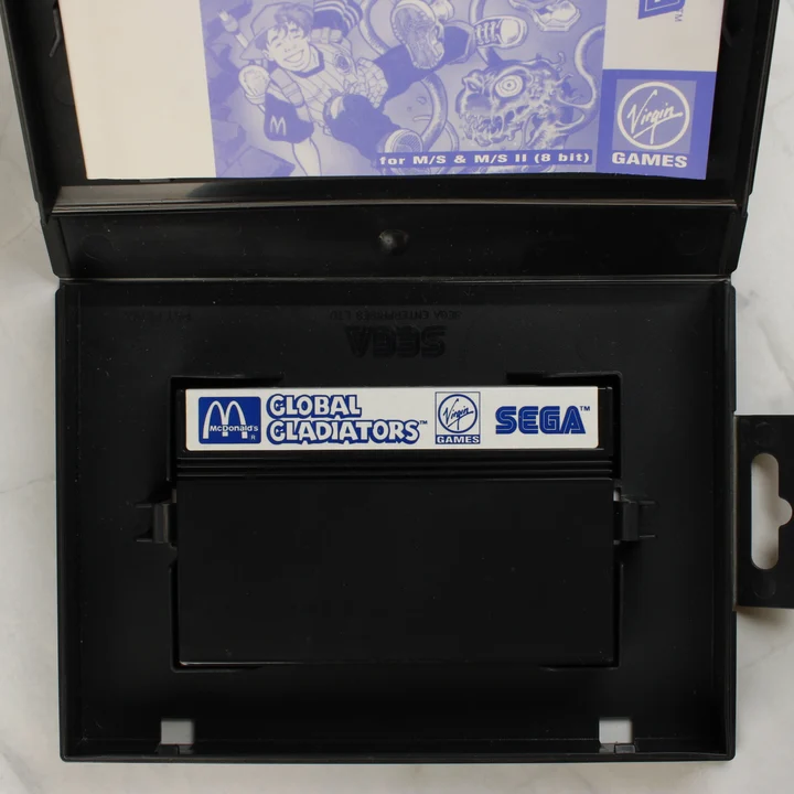 Global Gladiators Sega Master System nyitott doboz cartridge-al