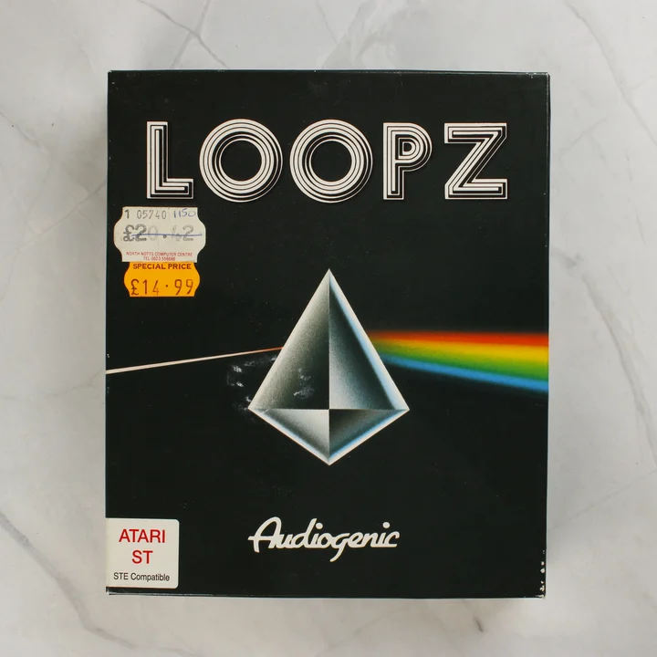 A Loopz videójáték fekete kartondoboza prizmás grafikával és árcímkékkel.