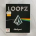 A Loopz videójáték fekete kartondoboza prizmás grafikával és árcímkékkel.