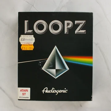 A Loopz videójáték fekete kartondoboza prizmás grafikával és árcímkékkel.