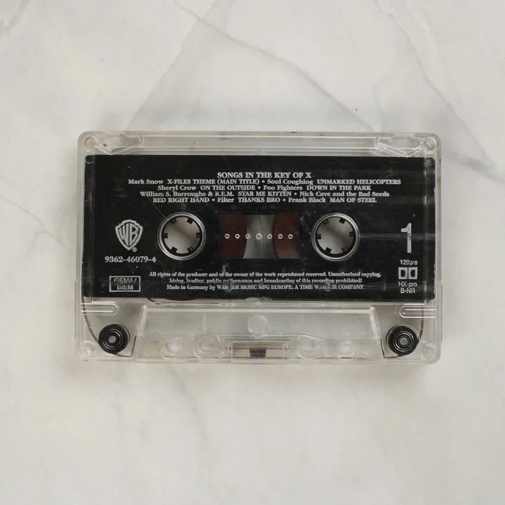 Songs In The Key Of X átlátszó magnókazetta közelről