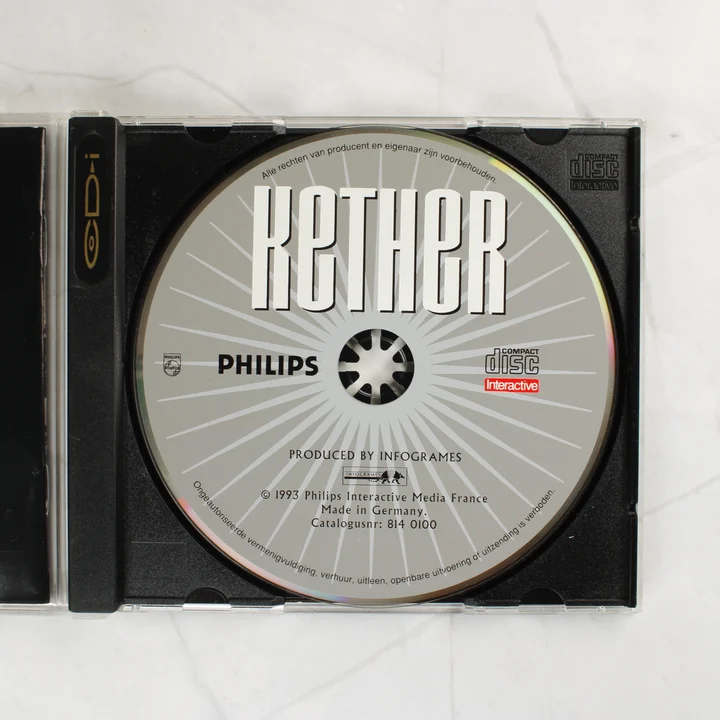 Kether CD-i videójáték lemez a nyitott tokban