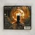 Mortal Kombat filmzene CD hátlapja a számlistával