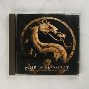 Mortal Kombat filmzene CD előlapja a sárkány logóval