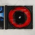 Armageddon: The Album nyitott CD-tok a lemezzel