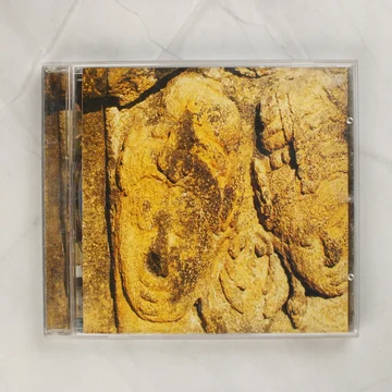 Korai Öröm '96 CD előlapja kőfaragás grafikával