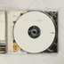 Nyitott CD-tok a Thievery Corporation lemezzel