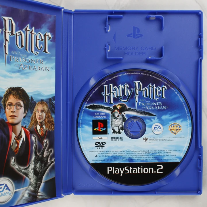 Nyitott Harry Potter PS2 tok lemezzel és útmutatóval