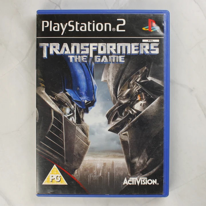 Transformers The Game PlayStation 2 játék előlapja