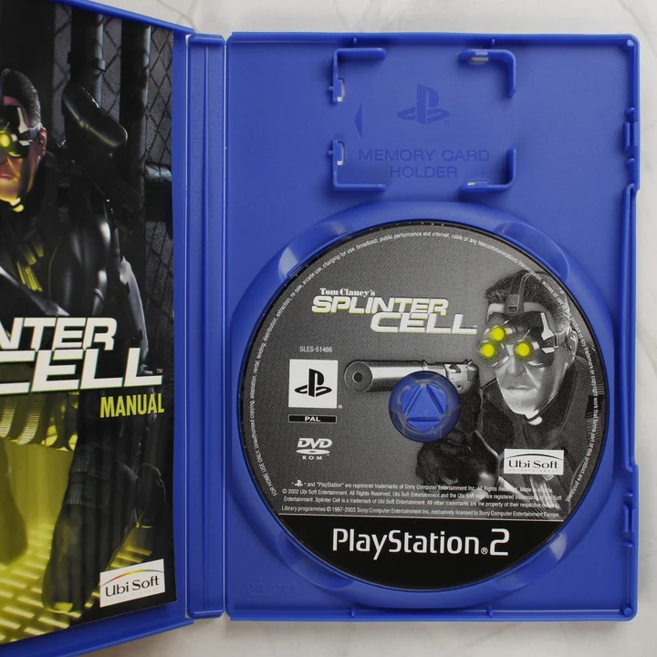 Splinter Cell PS2 tartalom Nyitott Splinter Cell PS2 tok lemezzel és útmutatóval