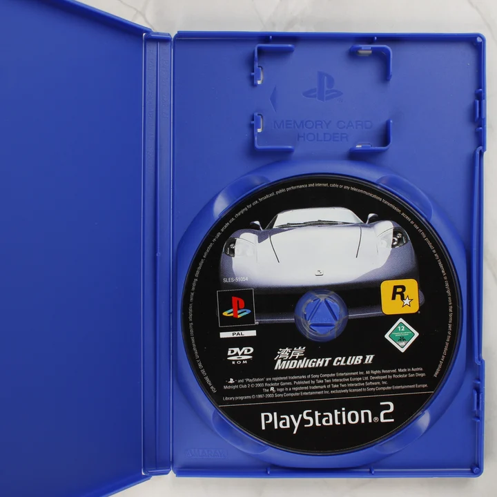 Midnight Club II PS2 lemez Midnight Club II PlayStation 2 lemez a nyitott tokban