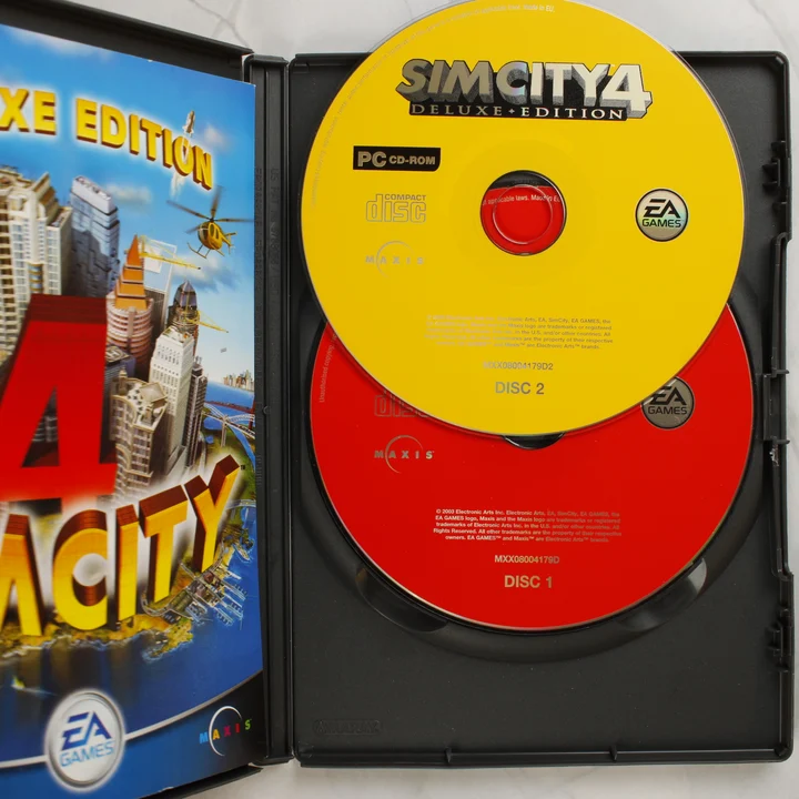 SimCity 4 Deluxe Edition nyitott tok és lemezek