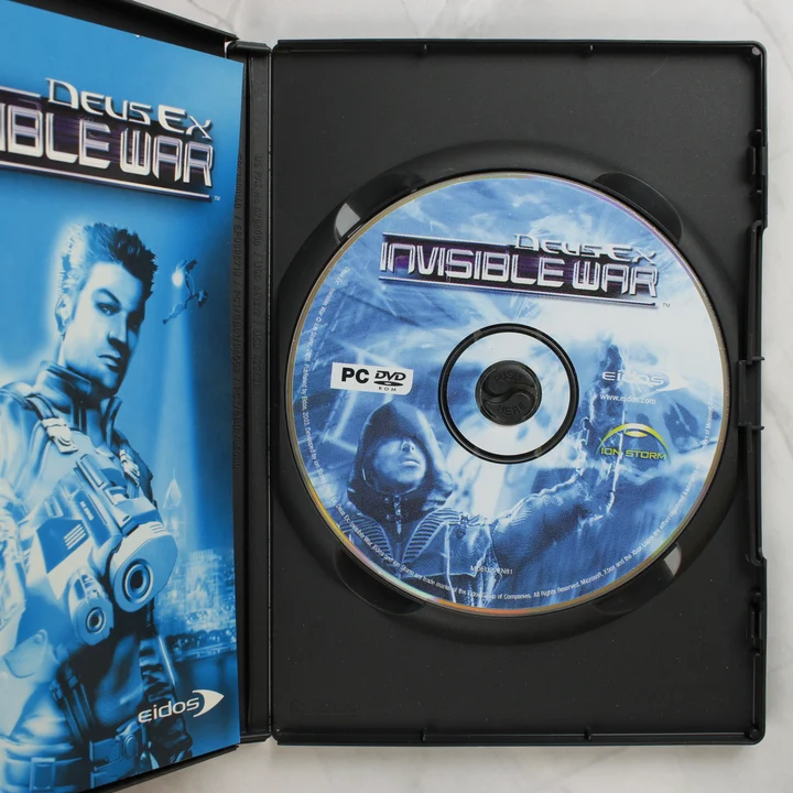 Nyitott Deus Ex Invisible War PC játék tok a lemezzel